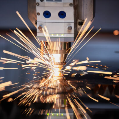 laser-cutting-metal-machining-with-sparks-on-cnc-laser-engraving-maching